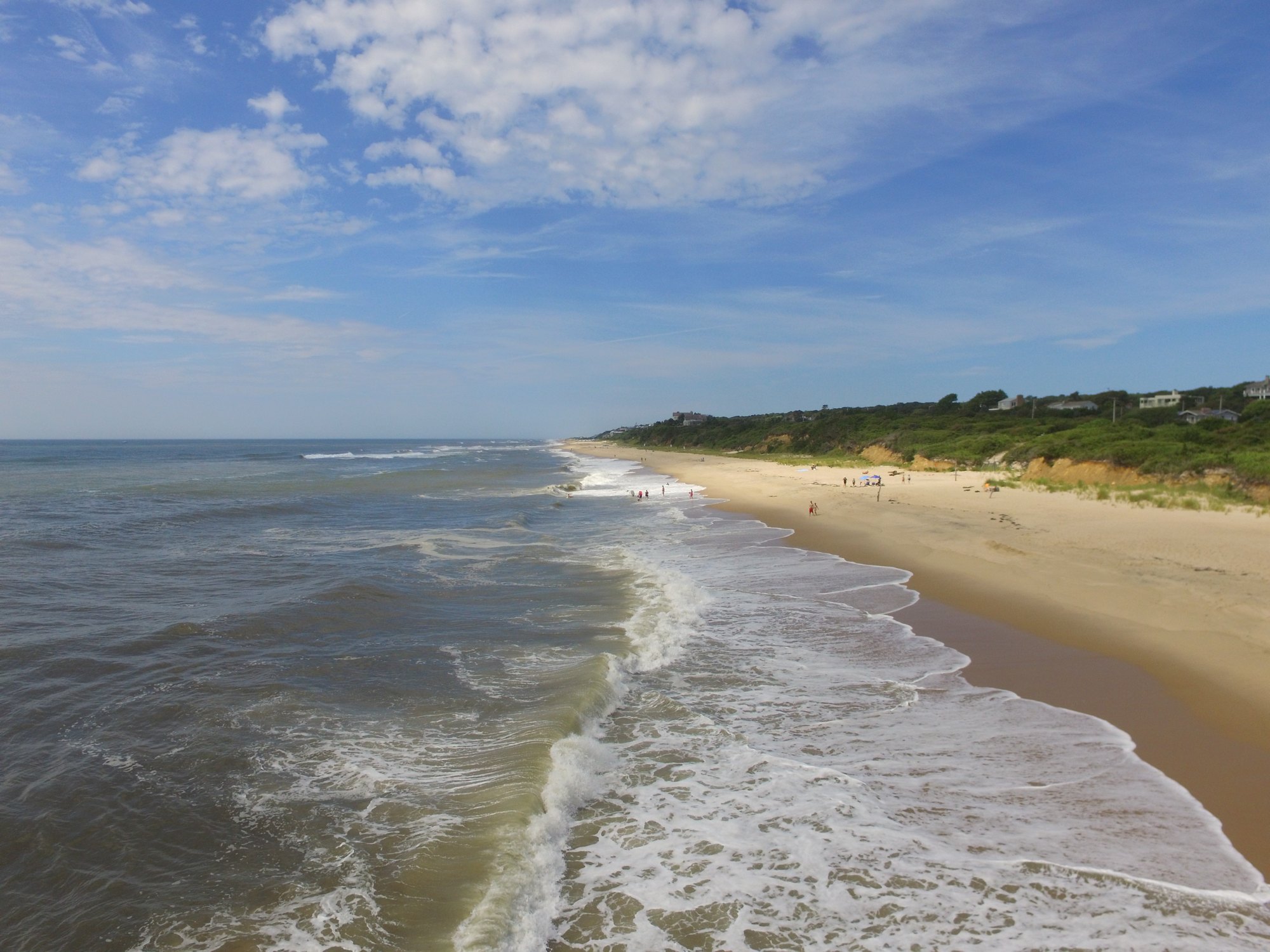 Atlantic waves meeting the sandy coastline in Montauk, Long Island